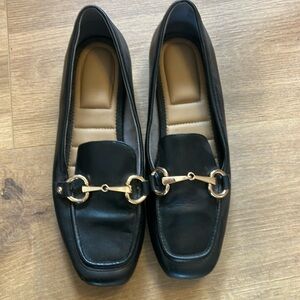 Black Loafers with Gold Detailing